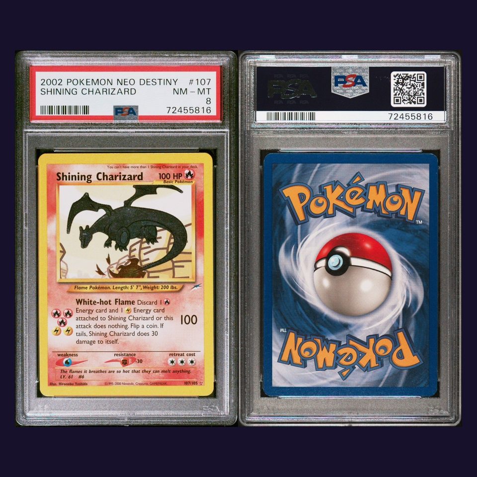 Shining Charizard 107/105 PSA 8: close-up of the slab label and card